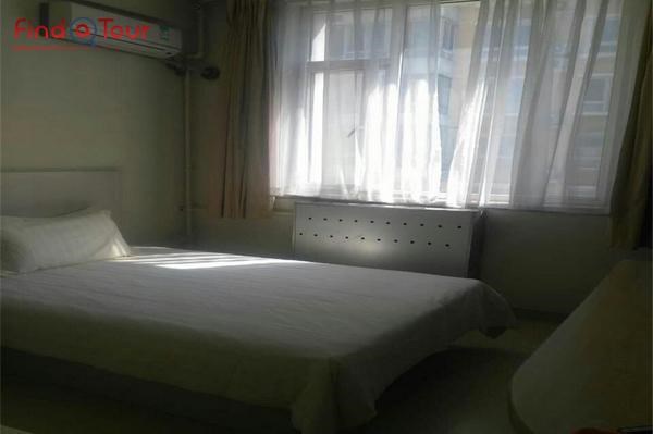اتاق خواب هتل جینجیانگ ین سونجیاژوانگ چین